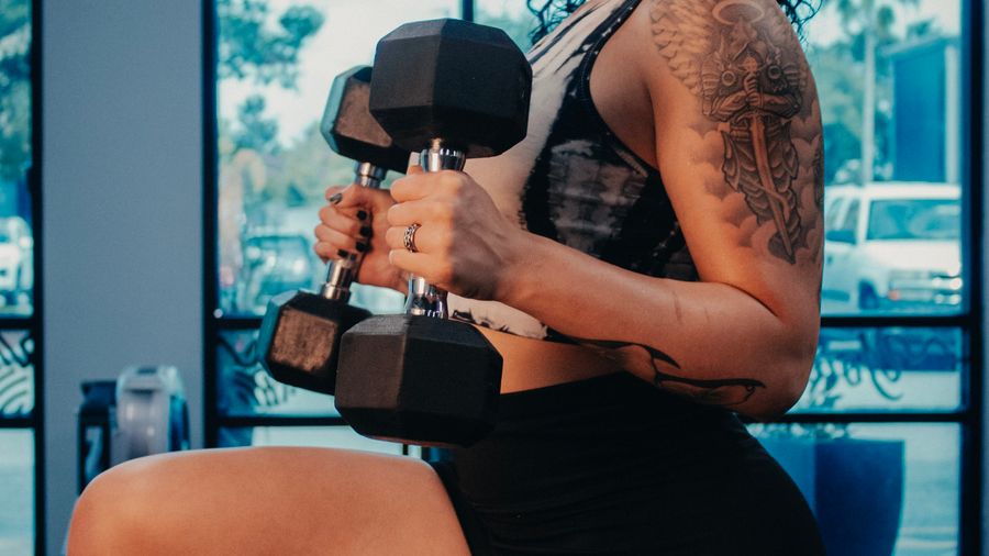 Dumbbell strength training in a gym